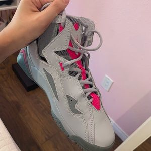 Jordan 7s in size 5y Pink and Grey .